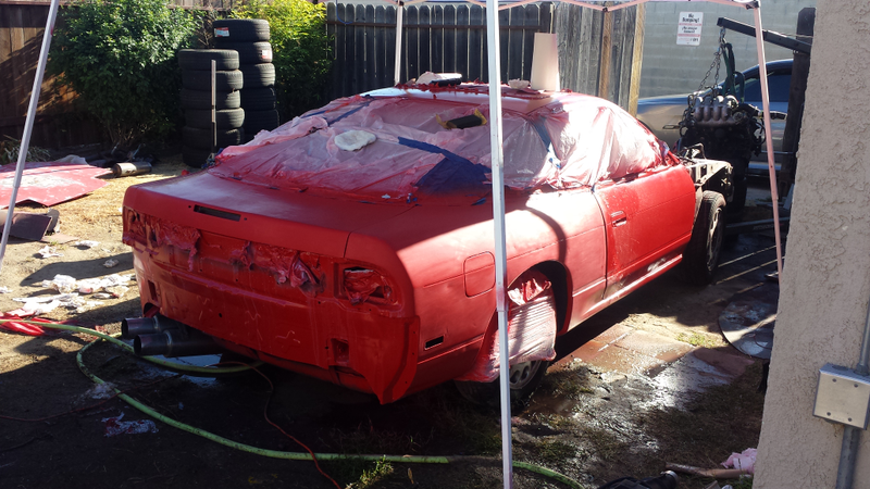 Illustration for article titled We Did a Backyard Paint Job on the Craigslist Project 240sx